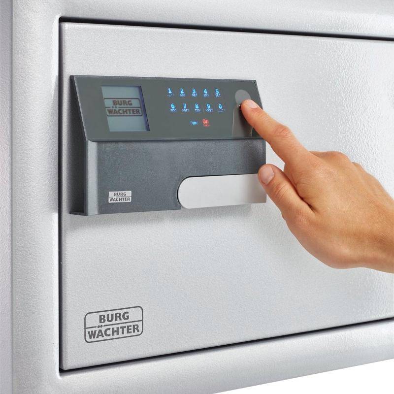 Hand using electronic lock on Burg Wachter Diplomat MTD 740 safe