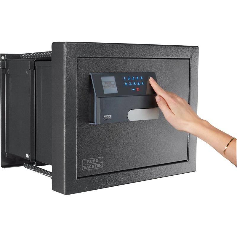 Burg Wachter WT614 Karat Wall Safe with biometric fingerprint scanner in use. Advanced wall safe with electronic access for secure home storage.