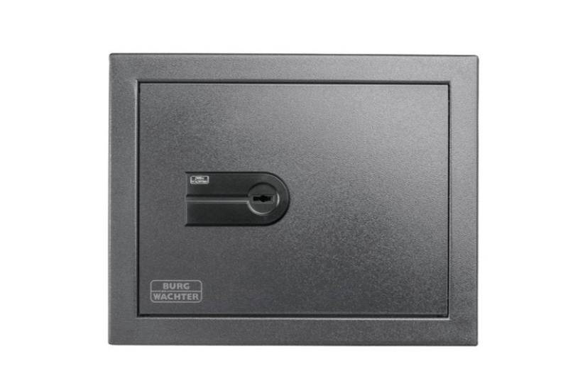 Front view of Burg Wachter WT614 Karat Wall Safe with closed door and keyhole. Heavy-duty wall safe for secure storage in home or business settings.