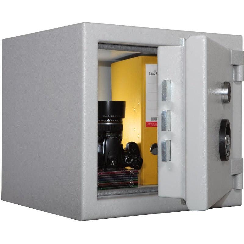 Secure Euro Grade safe with open door, storing camera equipment and documents.