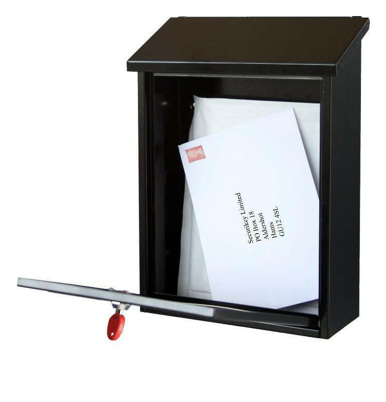 Secure black wall-mounted post box with lockable front access and mail inside.