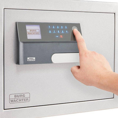 Hand using electronic keypad on Burg Wachter MT640 safe
