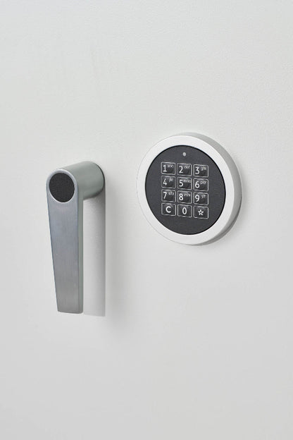 Close-up of De Raat DRS Combi-Fire 3 fire rated safe showing electronic keypad and handle, ideal for home and office security storage.